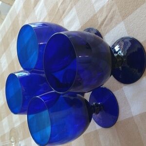 Set of four stemmed cobalt blue wine water goblets glasses